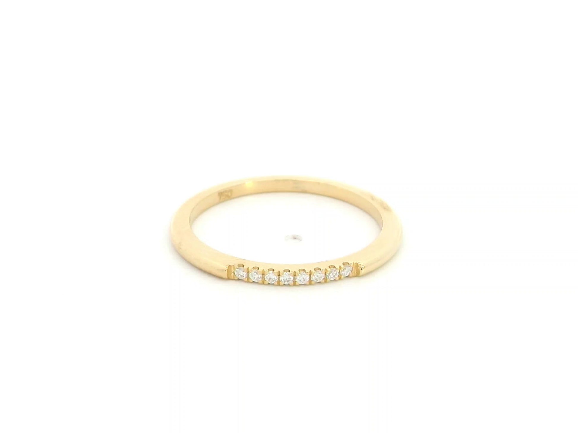18K yellow gold slim diamond stacking ring featuring 0.06 carat natural diamonds in a minimalist band design