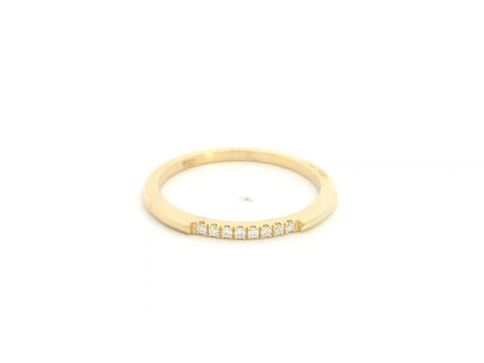 18K yellow gold slim diamond stacking ring featuring 0.06 carat natural diamonds in a minimalist band design