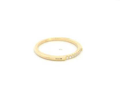 18K yellow gold slim diamond stacking ring featuring 0.06 carat natural diamonds in a minimalist band design