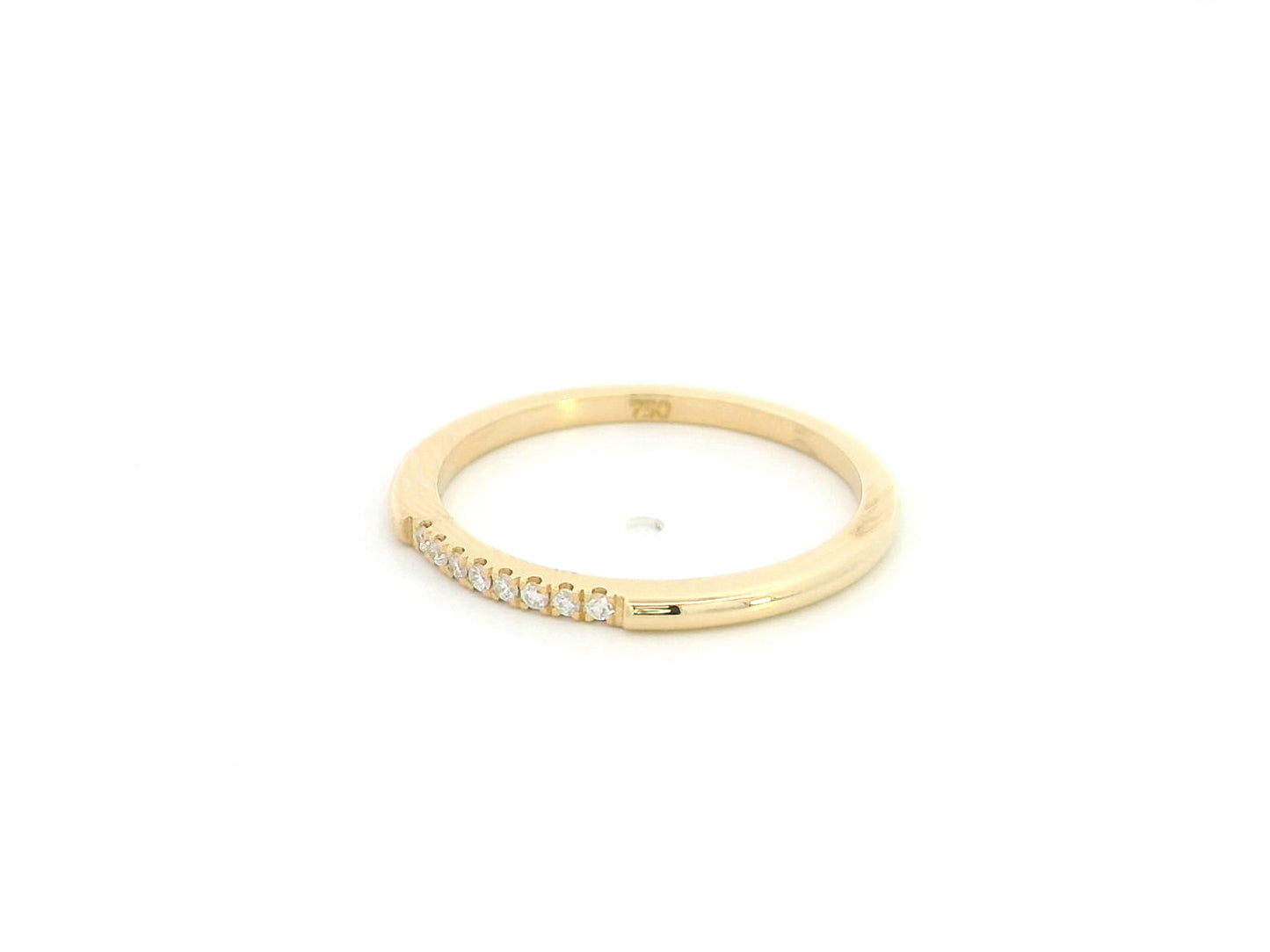 18K yellow gold slim diamond stacking ring featuring 0.06 carat natural diamonds in a minimalist band design