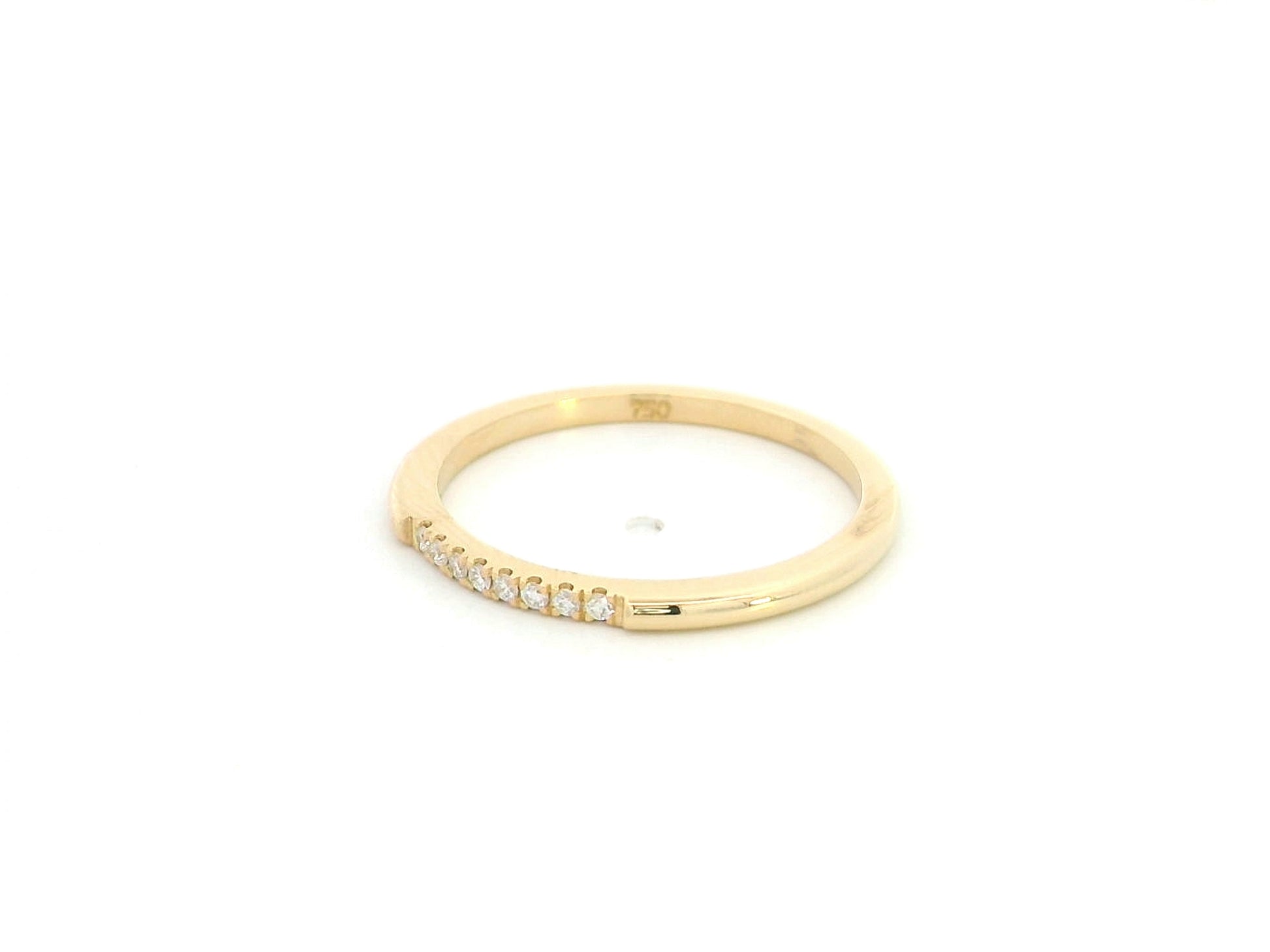 18K yellow gold slim diamond stacking ring featuring 0.06 carat natural diamonds in a minimalist band design