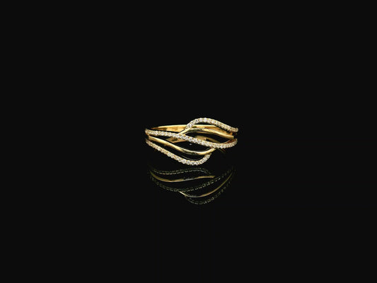 18K yellow gold wave diamond ring featuring a flowing multi-row design with 0.26 carat of round brilliant natural diamonds.