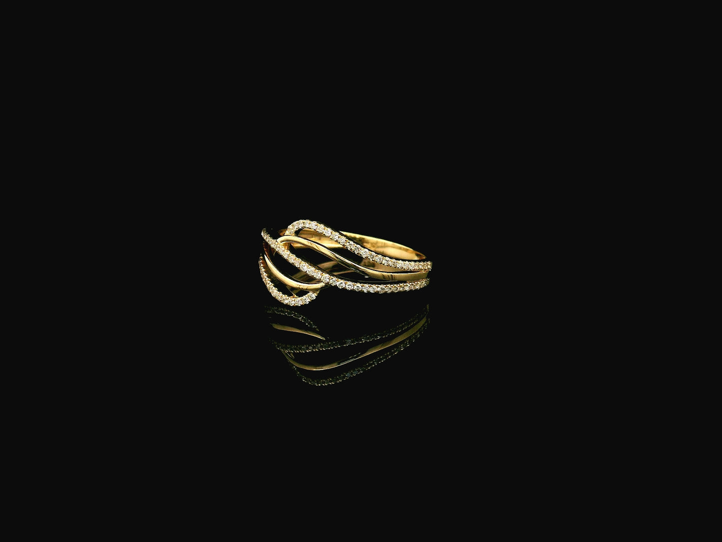 18K yellow gold wave diamond ring featuring a flowing multi-row design with 0.26 carat of round brilliant natural diamonds.