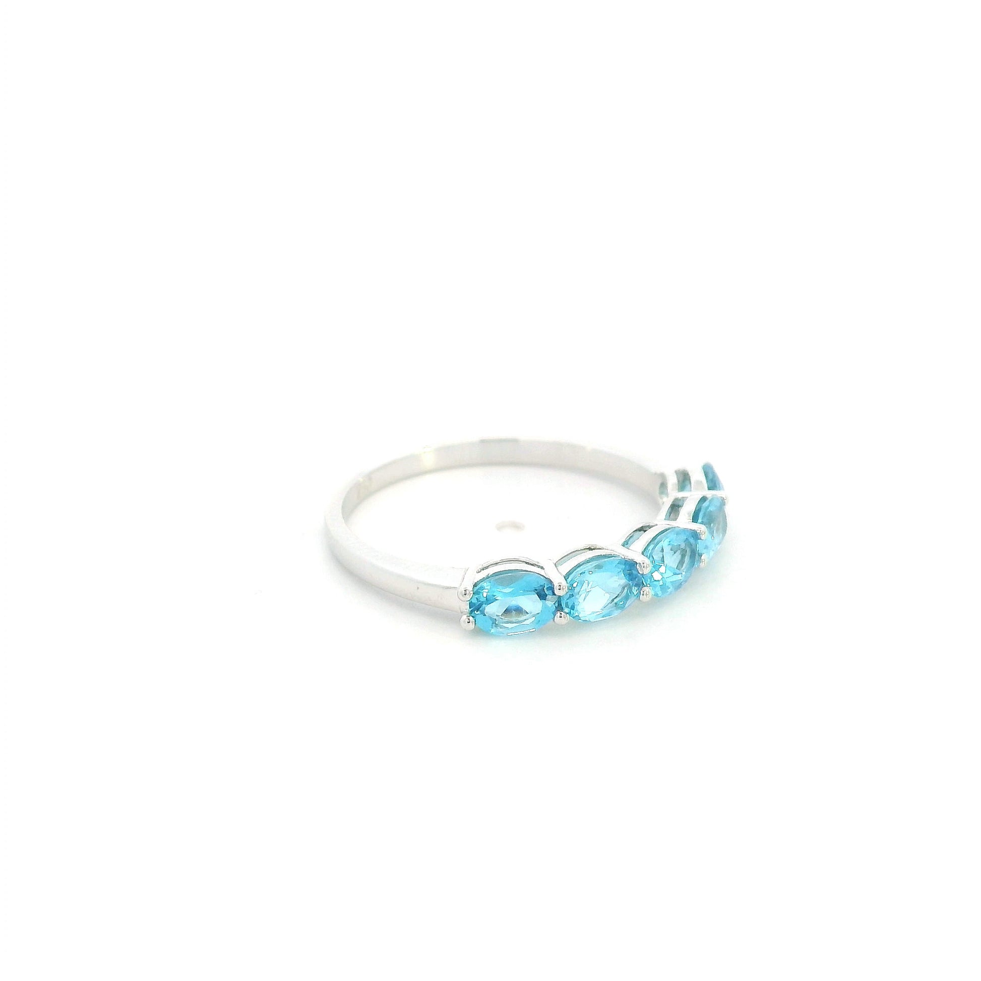 Blue Topaz five stone ring in 18K white gold featuring five oval blue topaz gemstones totaling 1.42 carats