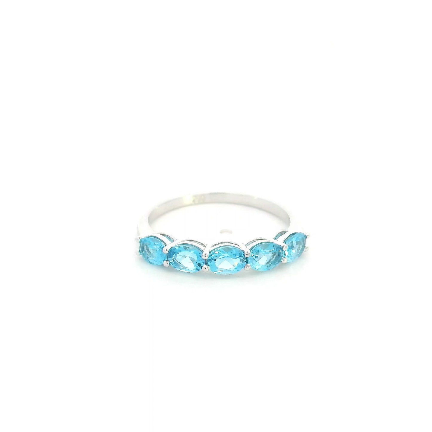Blue Topaz five stone ring in 18K white gold featuring five oval blue topaz gemstones totaling 1.42 carats