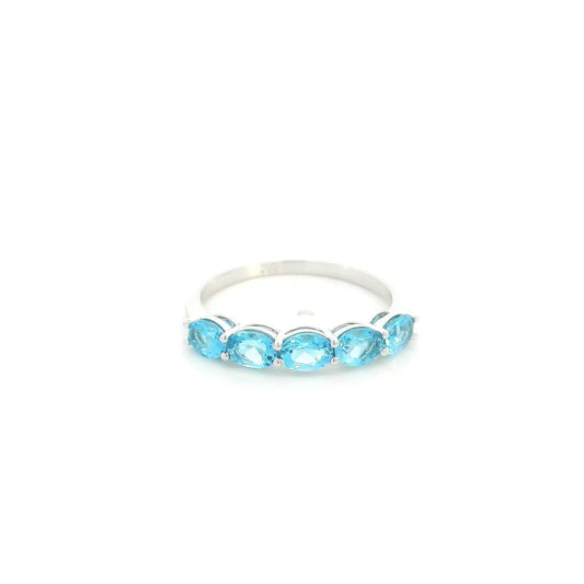 Blue Topaz five stone ring in 18K white gold featuring five oval blue topaz gemstones totaling 1.42 carats