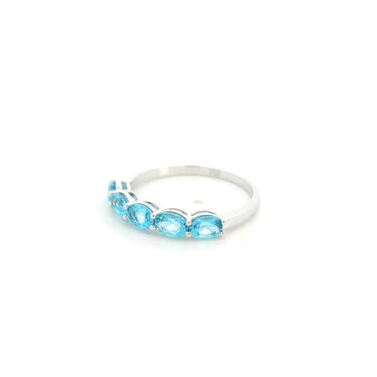 Blue Topaz five stone ring in 18K white gold featuring five oval blue topaz gemstones totaling 1.42 carats
