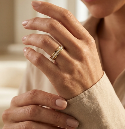 Diamond triple row band ring in 18K yellow gold with 0.25 carat natural diamonds and contemporary layered openwork design.