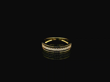 Diamond triple row band ring in 18K yellow gold with 0.25 carat natural diamonds and contemporary layered openwork design.