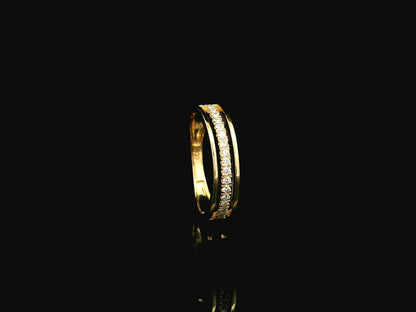 Diamond triple row band ring in 18K yellow gold with 0.25 carat natural diamonds and contemporary layered openwork design.