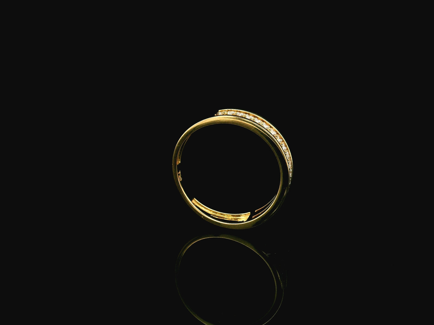 Diamond triple row band ring in 18K yellow gold with 0.25 carat natural diamonds and contemporary layered openwork design.