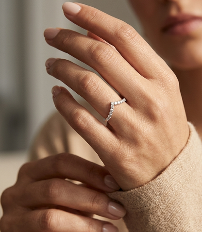 Diamond chevron wedding band ring in 18K white gold featuring 0.36 carat natural diamonds in a V-shaped design.