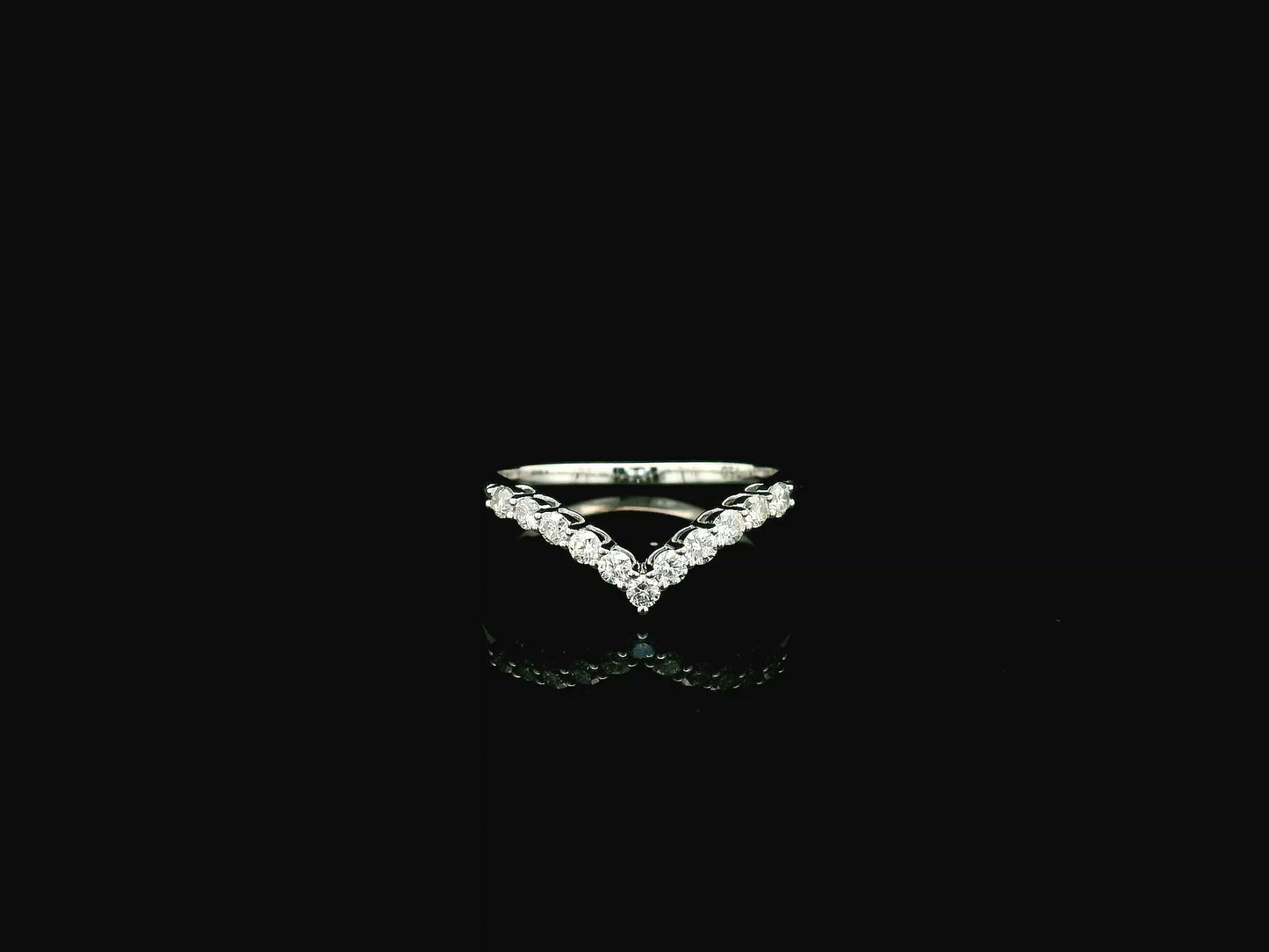 Diamond chevron wedding band ring in 18K white gold featuring 0.36 carat natural diamonds in a V-shaped design.
