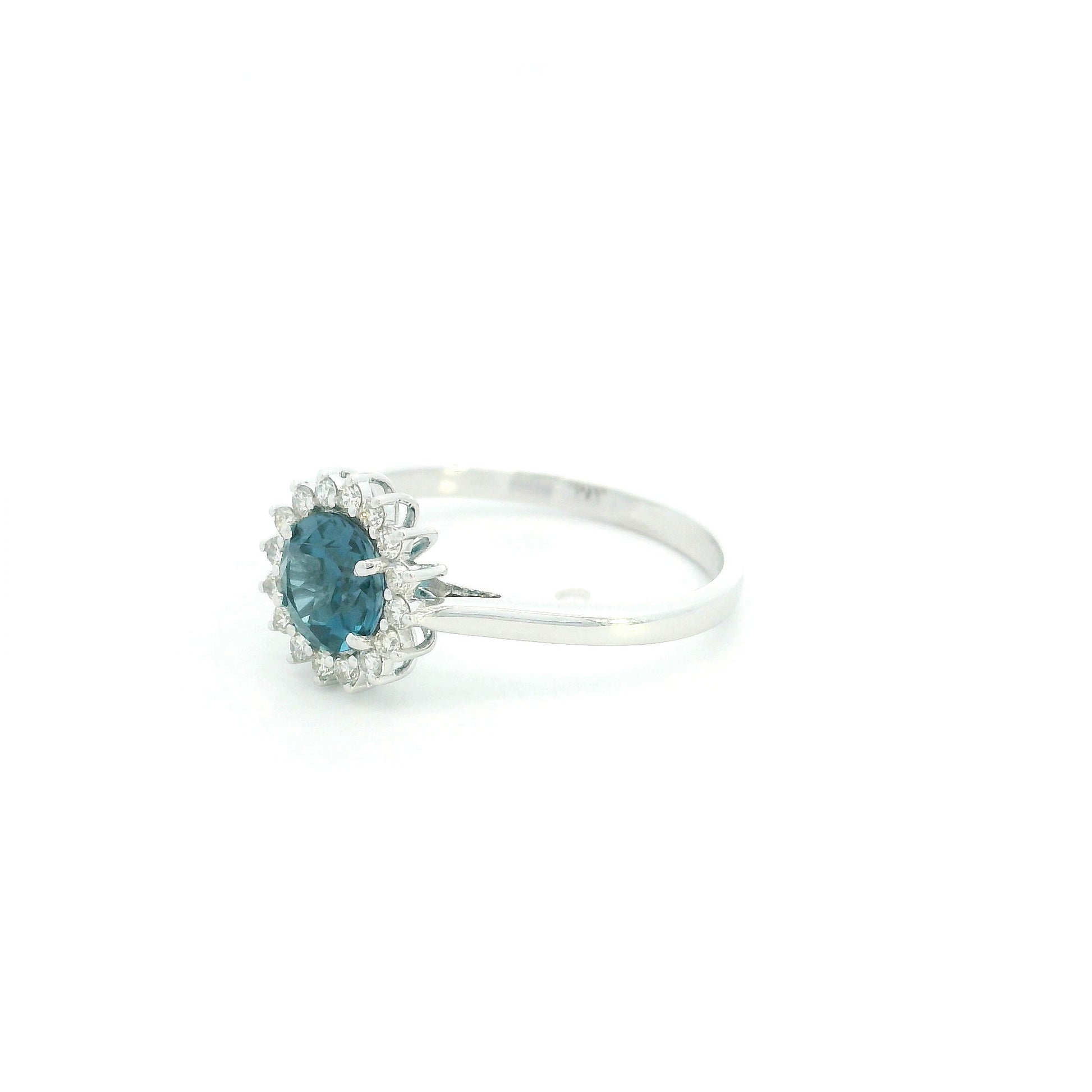 London Blue Topaz halo ring in 18K white gold with diamond floral halo and 0.93 carat center stone