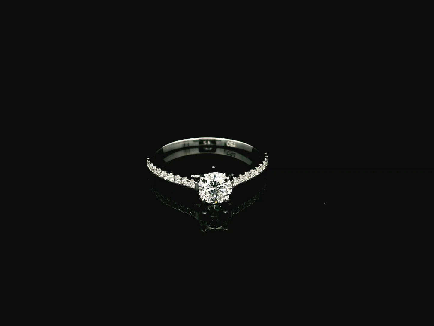 GIA certified 0.50 carat round diamond solitaire engagement ring in 18K white gold with diamond pavé band