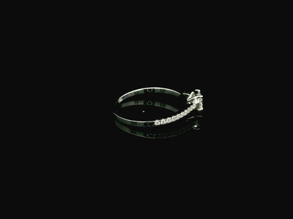GIA certified 0.50 carat round diamond solitaire engagement ring in 18K white gold with diamond pavé band
