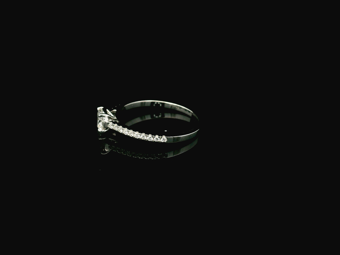 GIA certified 0.50 carat round diamond solitaire engagement ring in 18K white gold with diamond pavé band