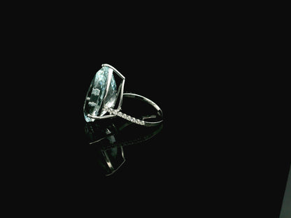 15.60 carat pear cut aquamarine ring in 18K white gold with pavé diamond band