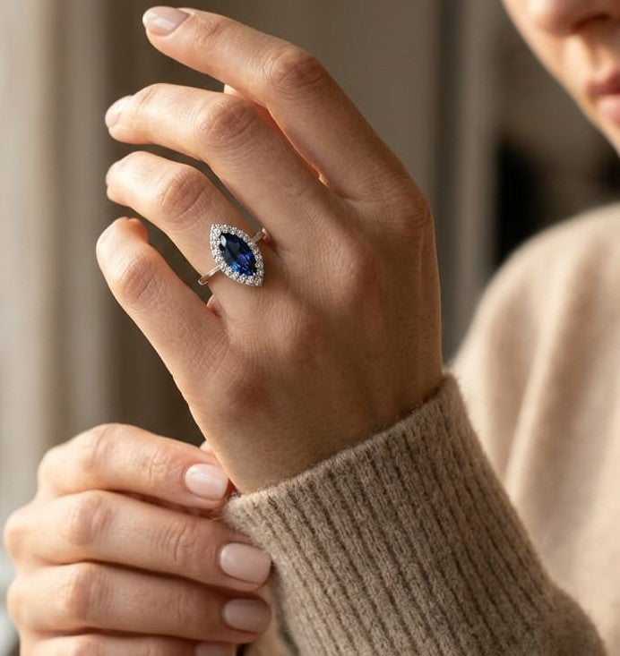 Marquise sapphire and diamond halo ring in 18K white gold with 1.14 carat natural sapphire