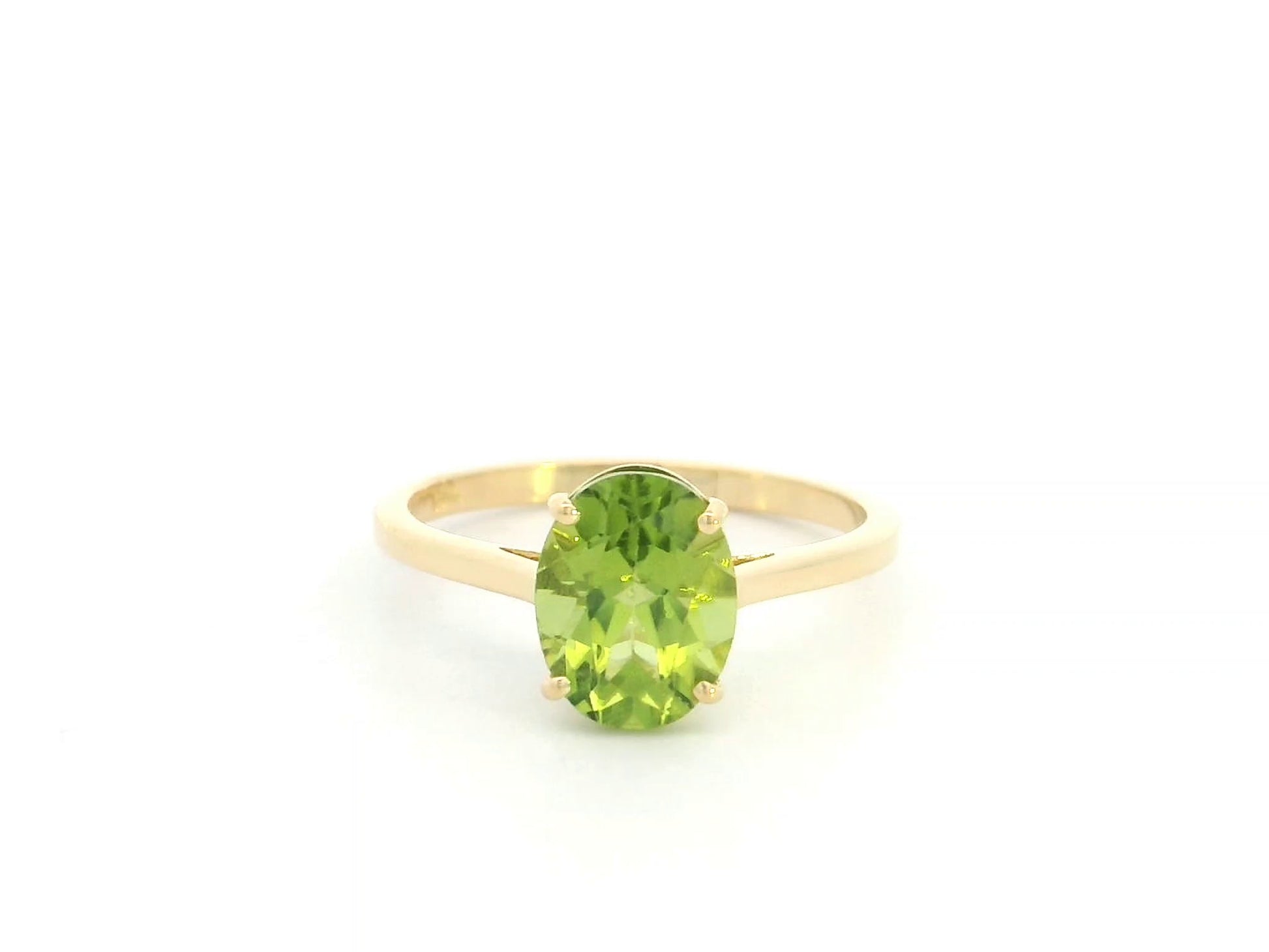 18K yellow gold oval peridot solitaire ring featuring a 2.17 carat natural peridot gemstone