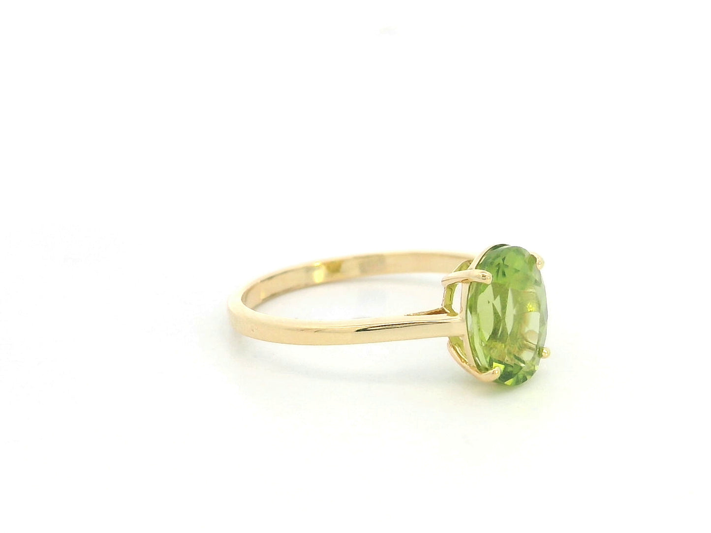 18K yellow gold oval peridot solitaire ring featuring a 2.17 carat natural peridot gemstone