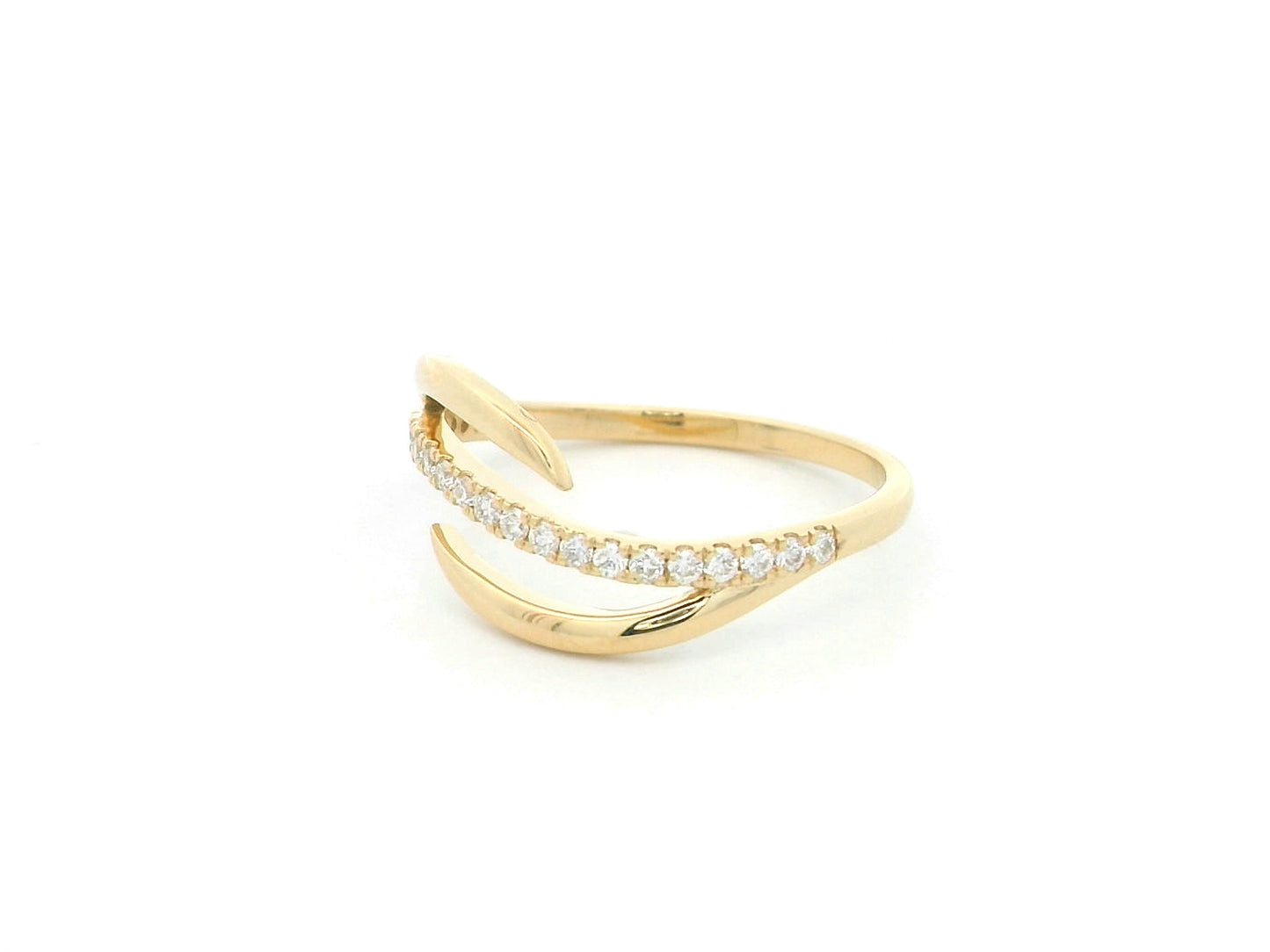 18K yellow gold diamond crossover ring featuring a flowing twist design set with 0.21 carat natural diamonds.