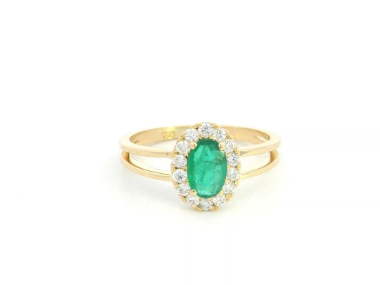 18K yellow gold emerald halo ring featuring a 0.56 carat oval natural emerald surrounded by a 0.28 carat natural diamond halo with an elegant split-band design.