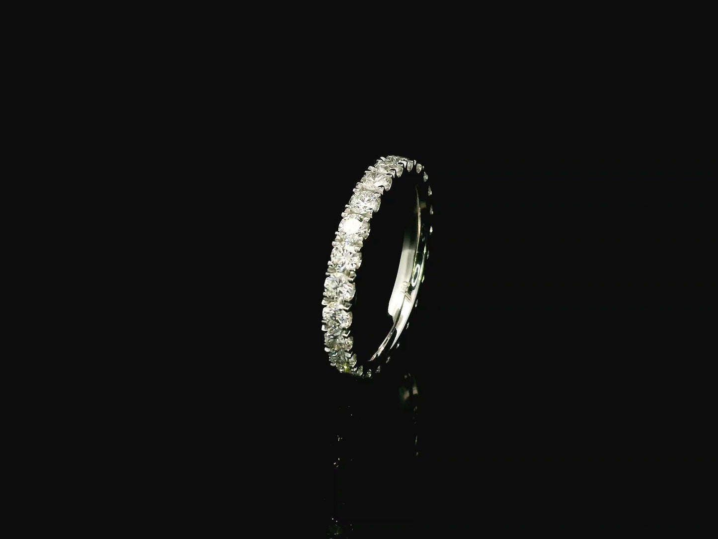 18K white gold full eternity diamond ring featuring 1.88 carats of natural round brilliant diamonds in prong setting, handcrafted as a made-to-order wedding band.