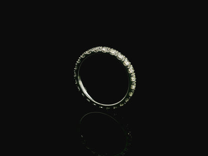 18K white gold full eternity diamond ring featuring 1.88 carats of natural round brilliant diamonds in prong setting, handcrafted as a made-to-order wedding band.