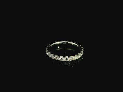 18K white gold full eternity diamond ring featuring 1.88 carats of natural round brilliant diamonds in prong setting, handcrafted as a made-to-order wedding band.