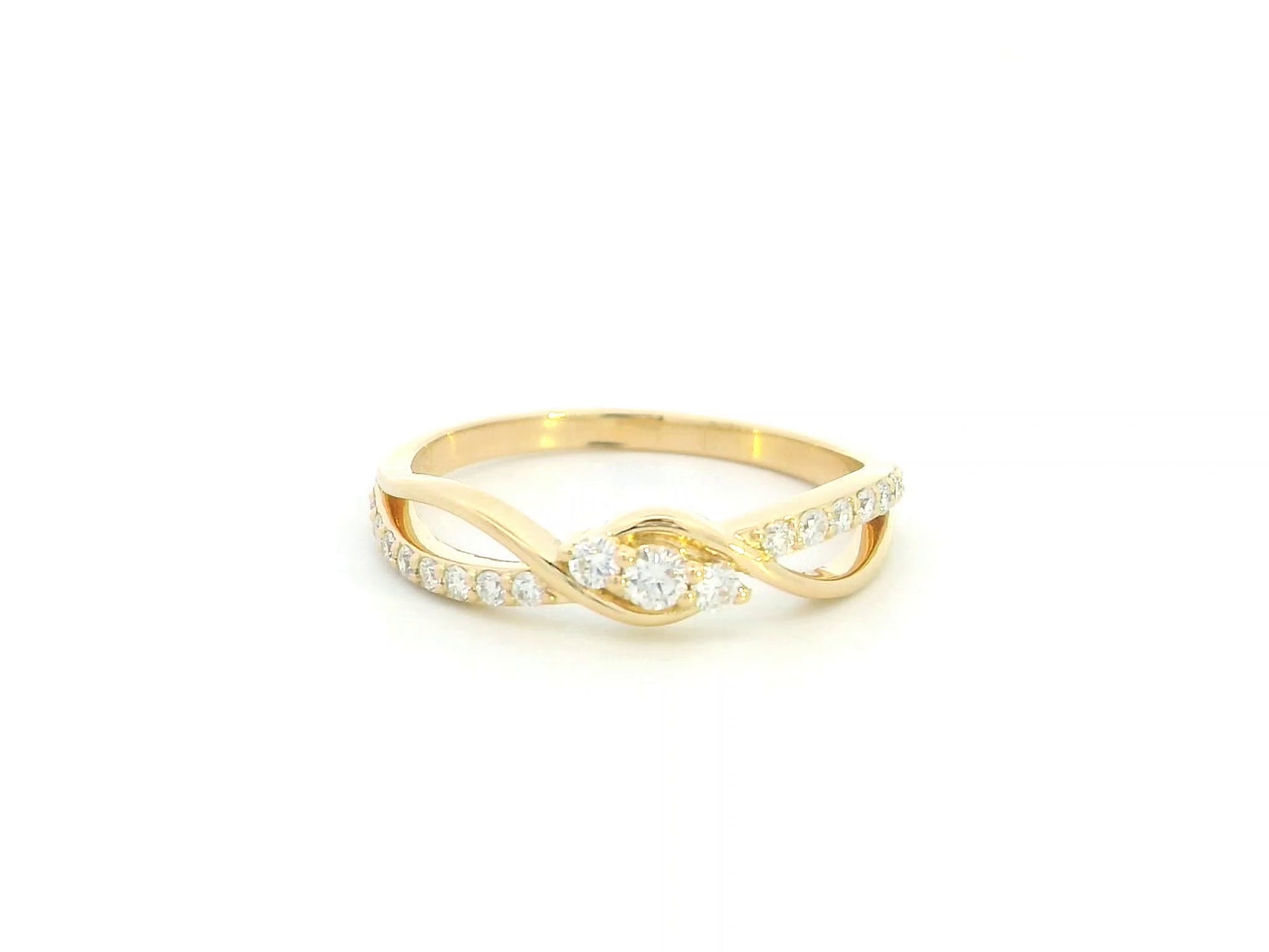 Natural diamond infinity ring in solid 18K yellow gold featuring 0.28 carat round brilliant diamonds in an elegant flowing infinity design.