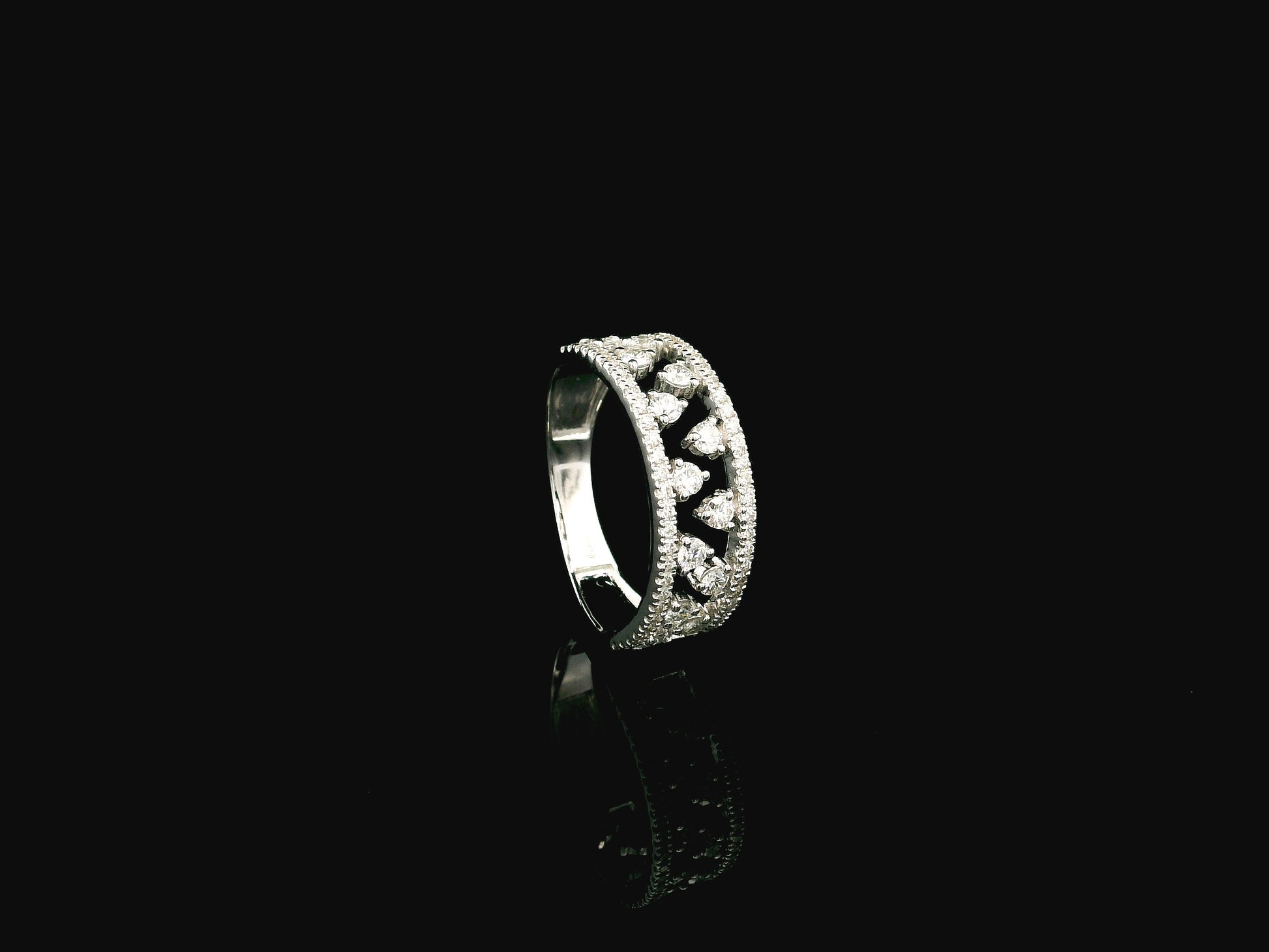 18K white gold natural diamond openwork ring featuring 0.68 carat round brilliant diamonds in a layered floating design with pavé diamond accents.