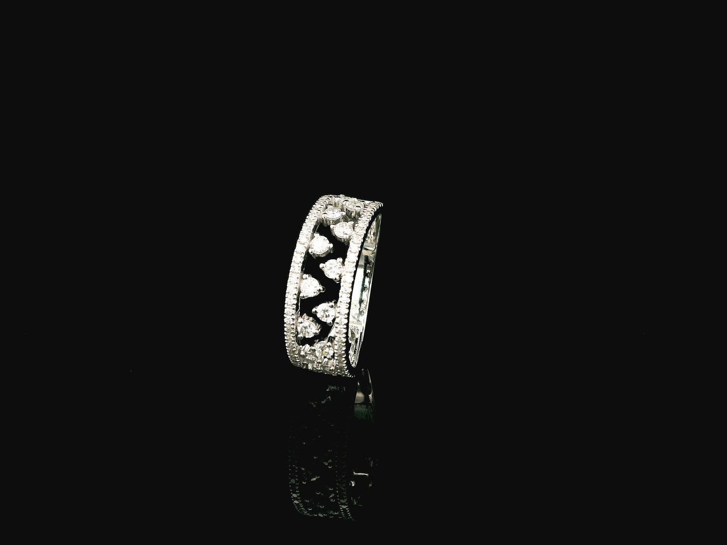 18K white gold natural diamond openwork ring featuring 0.68 carat round brilliant diamonds in a layered floating design with pavé diamond accents.