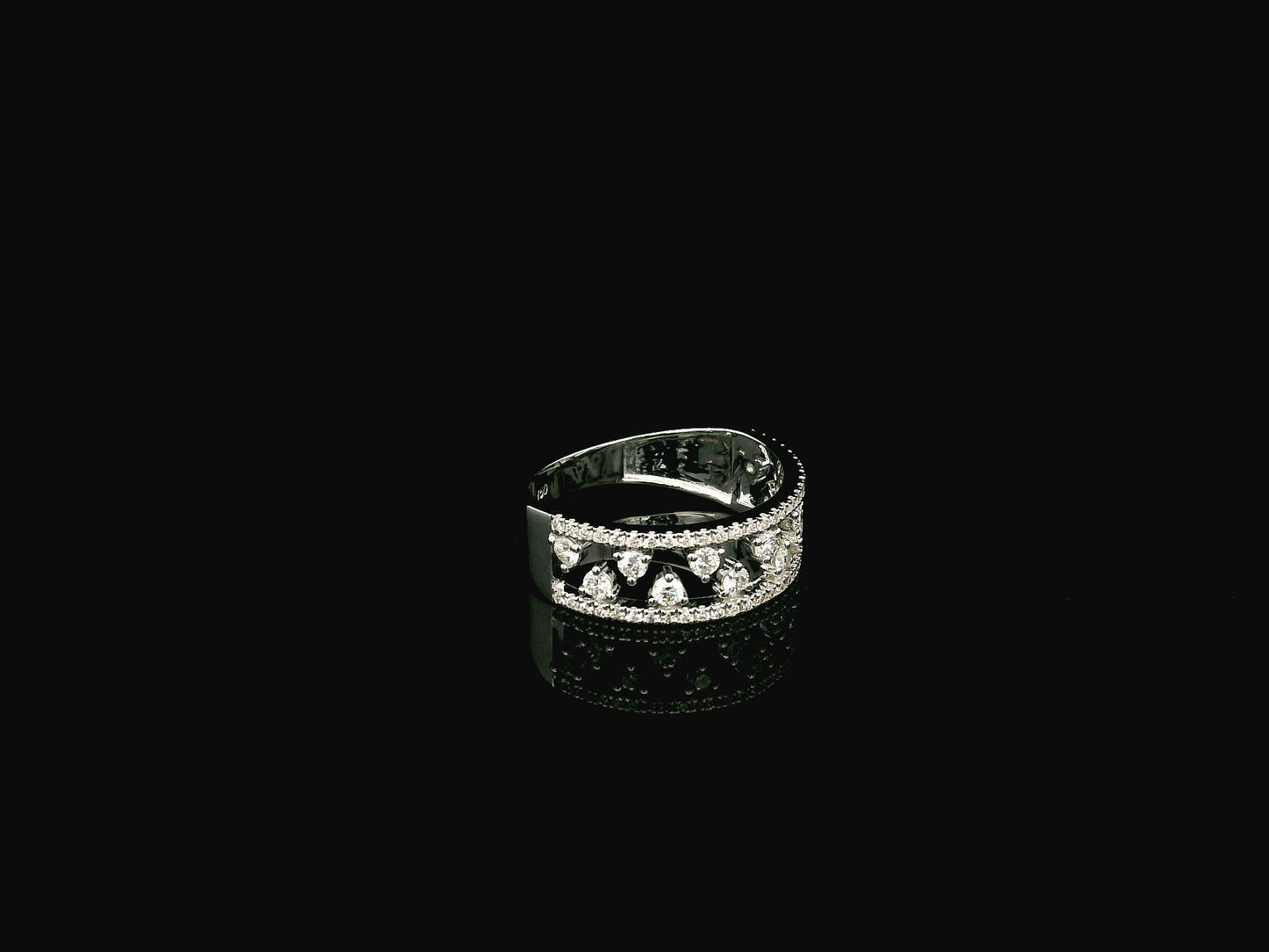 18K white gold natural diamond openwork ring featuring 0.68 carat round brilliant diamonds in a layered floating design with pavé diamond accents.