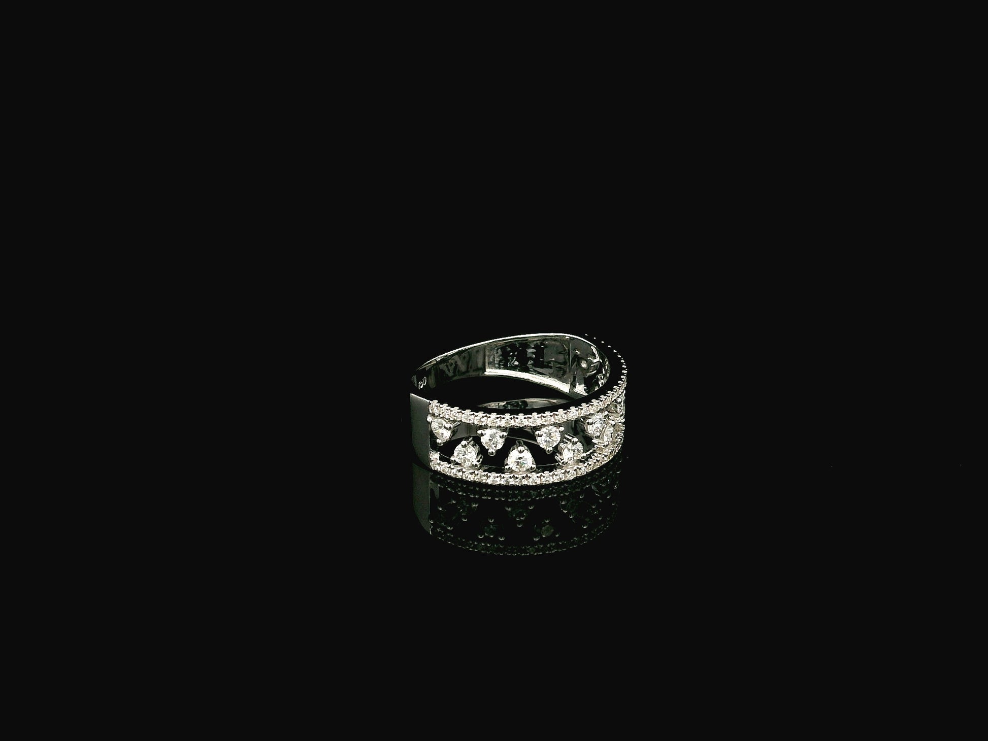 18K white gold natural diamond openwork ring featuring 0.68 carat round brilliant diamonds in a layered floating design with pavé diamond accents.