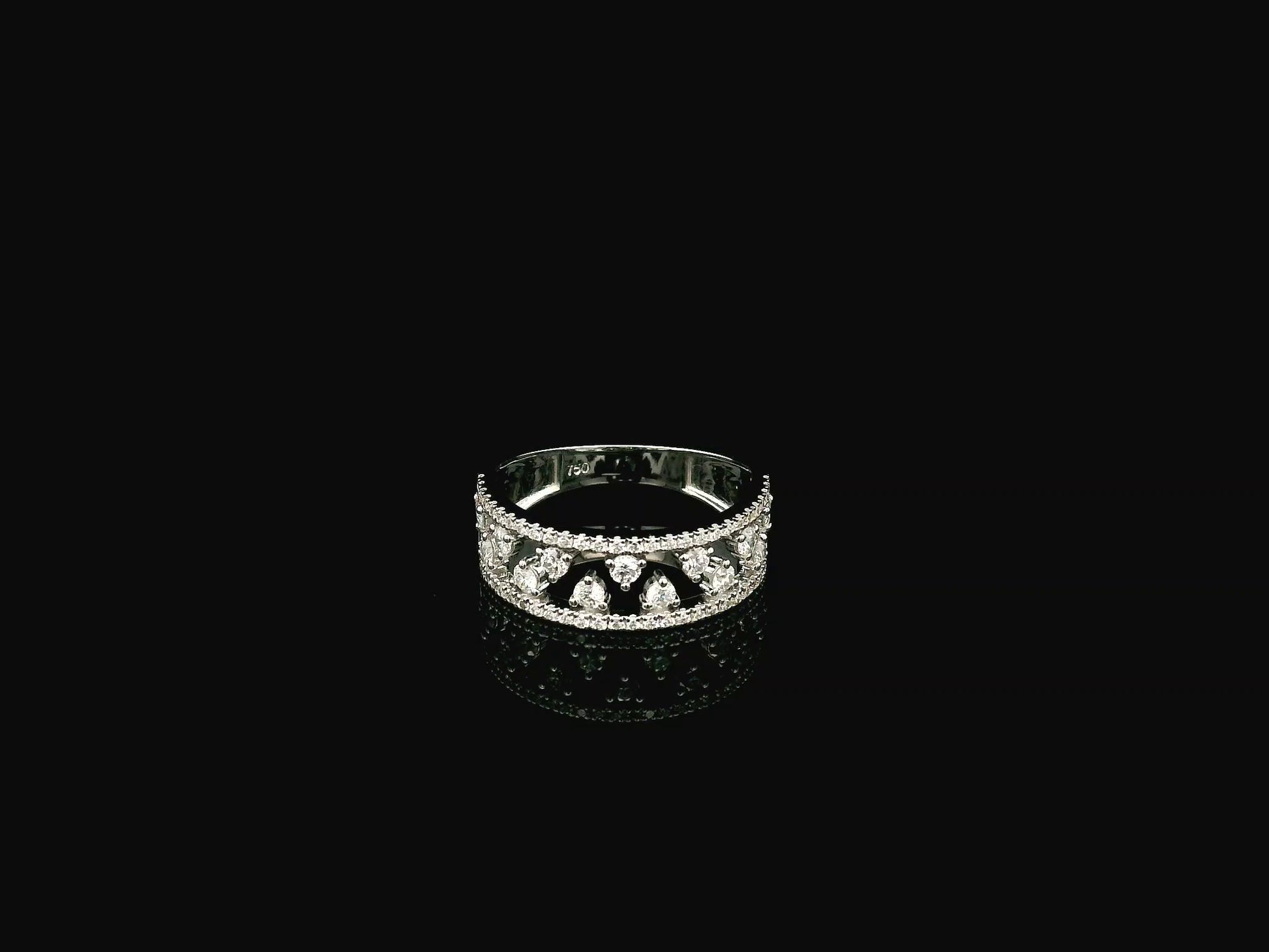 18K white gold natural diamond openwork ring featuring 0.68 carat round brilliant diamonds in a layered floating design with pavé diamond accents.