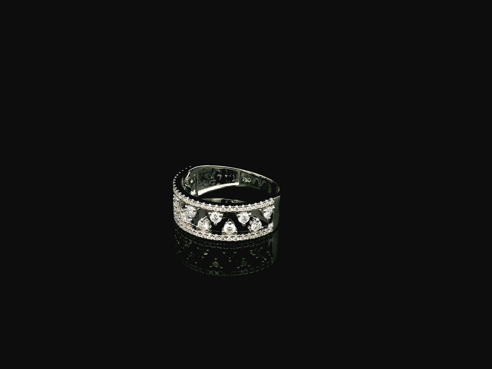 18K white gold natural diamond openwork ring featuring 0.68 carat round brilliant diamonds in a layered floating design with pavé diamond accents.