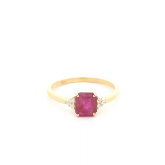 18K yellow gold emerald cut ruby ring featuring a 0.97 Carat natural ruby with sparkling natural diamond side accents.