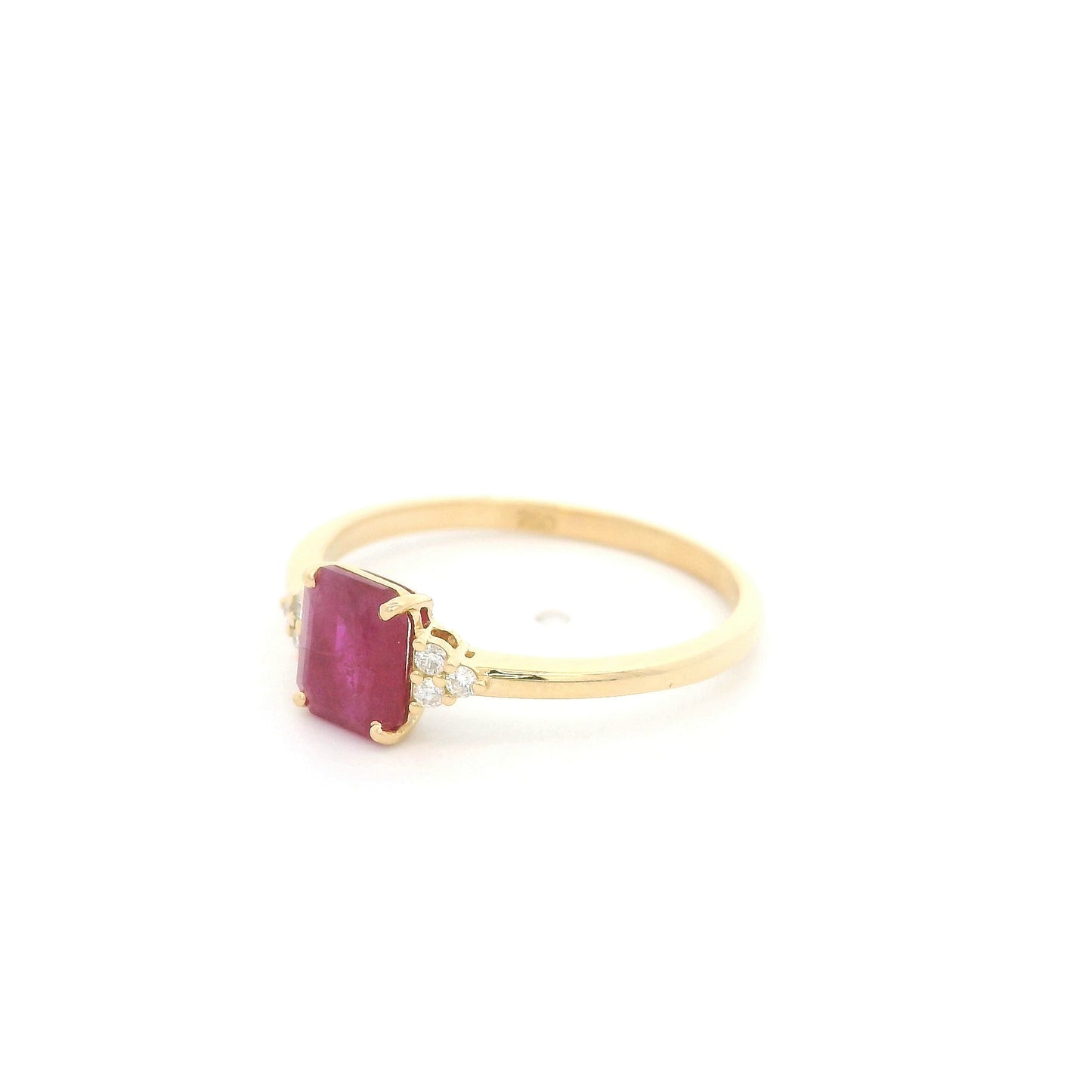 18K yellow gold emerald cut ruby ring featuring a 0.97 Carat natural ruby with sparkling natural diamond side accents.