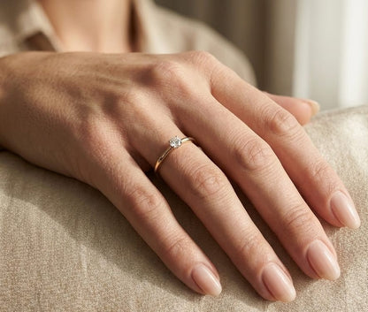 18K Yellow Gold Diamond Solitaire Ring featuring a 0.16 carat natural round brilliant diamond in a classic four-prong setting, minimalist dainty engagement ring.