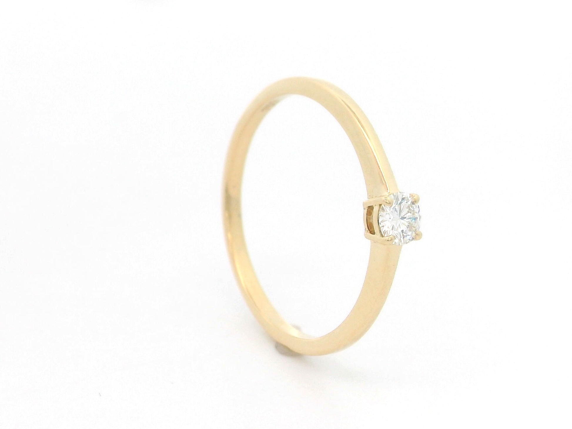 18K Yellow Gold Diamond Solitaire Ring featuring a 0.16 carat natural round brilliant diamond in a classic four-prong setting, minimalist dainty engagement ring.