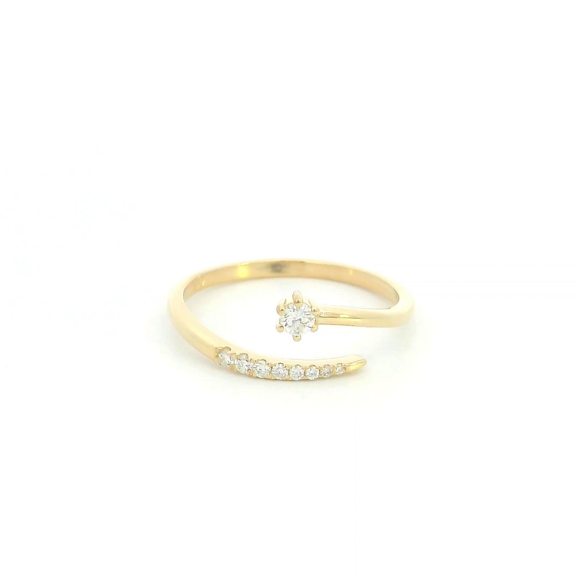 18K yellow gold open diamond ring featuring a round brilliant diamond with a curved row of natural diamonds in a minimalist wrap design.