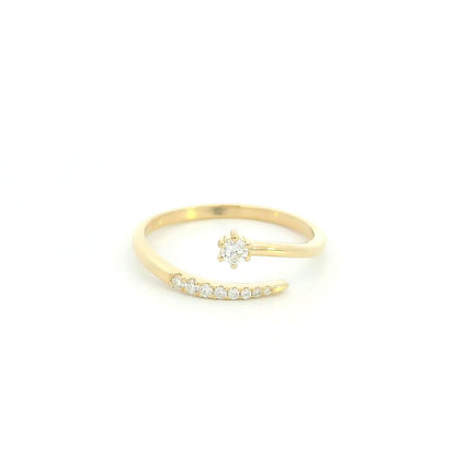 18K yellow gold open diamond ring featuring a round brilliant diamond with a curved row of natural diamonds in a minimalist wrap design.
