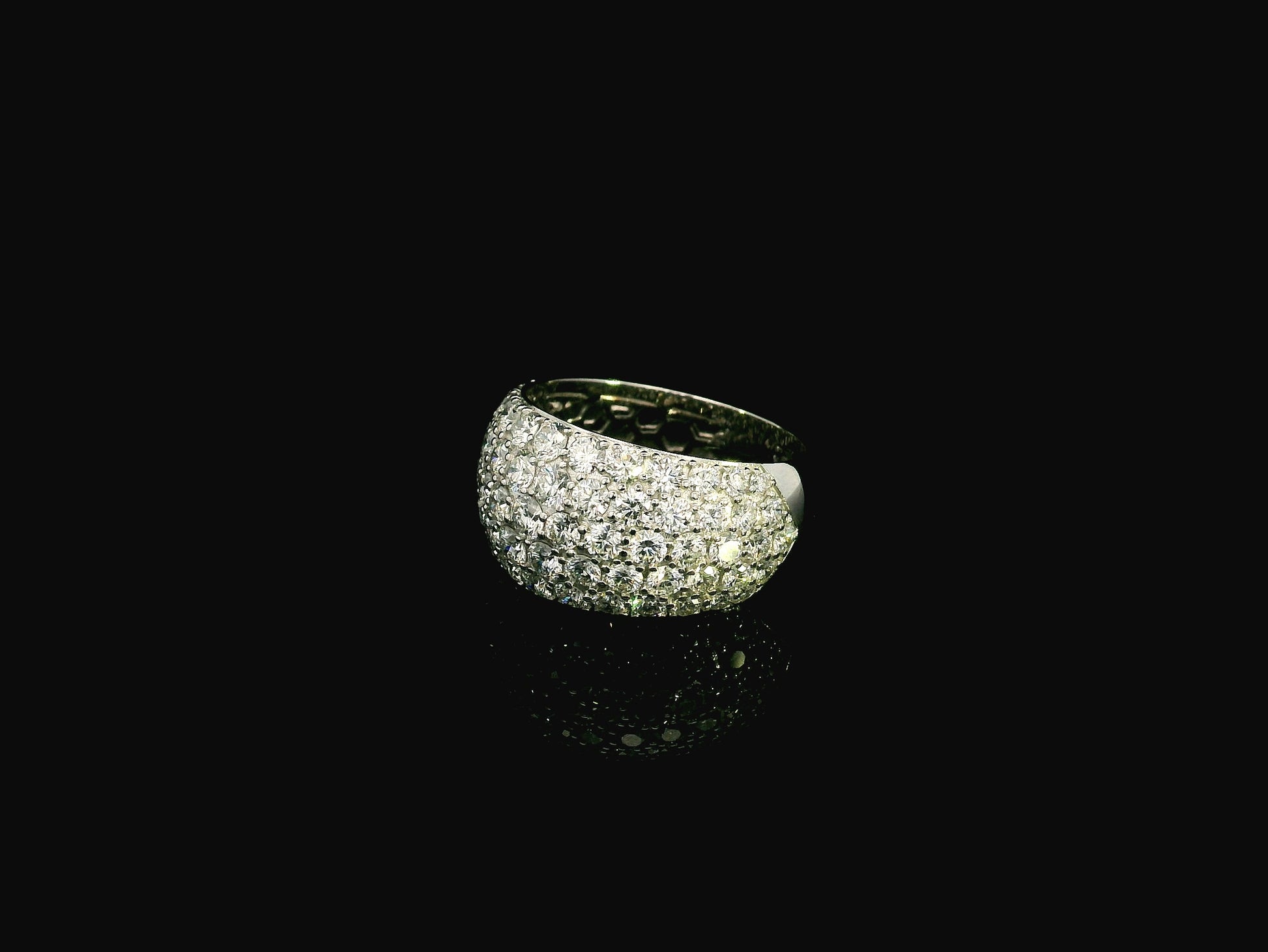 18K white gold wide dome ring featuring 3.21 carats of natural pavé-set diamonds with polished white gold shoulders.
