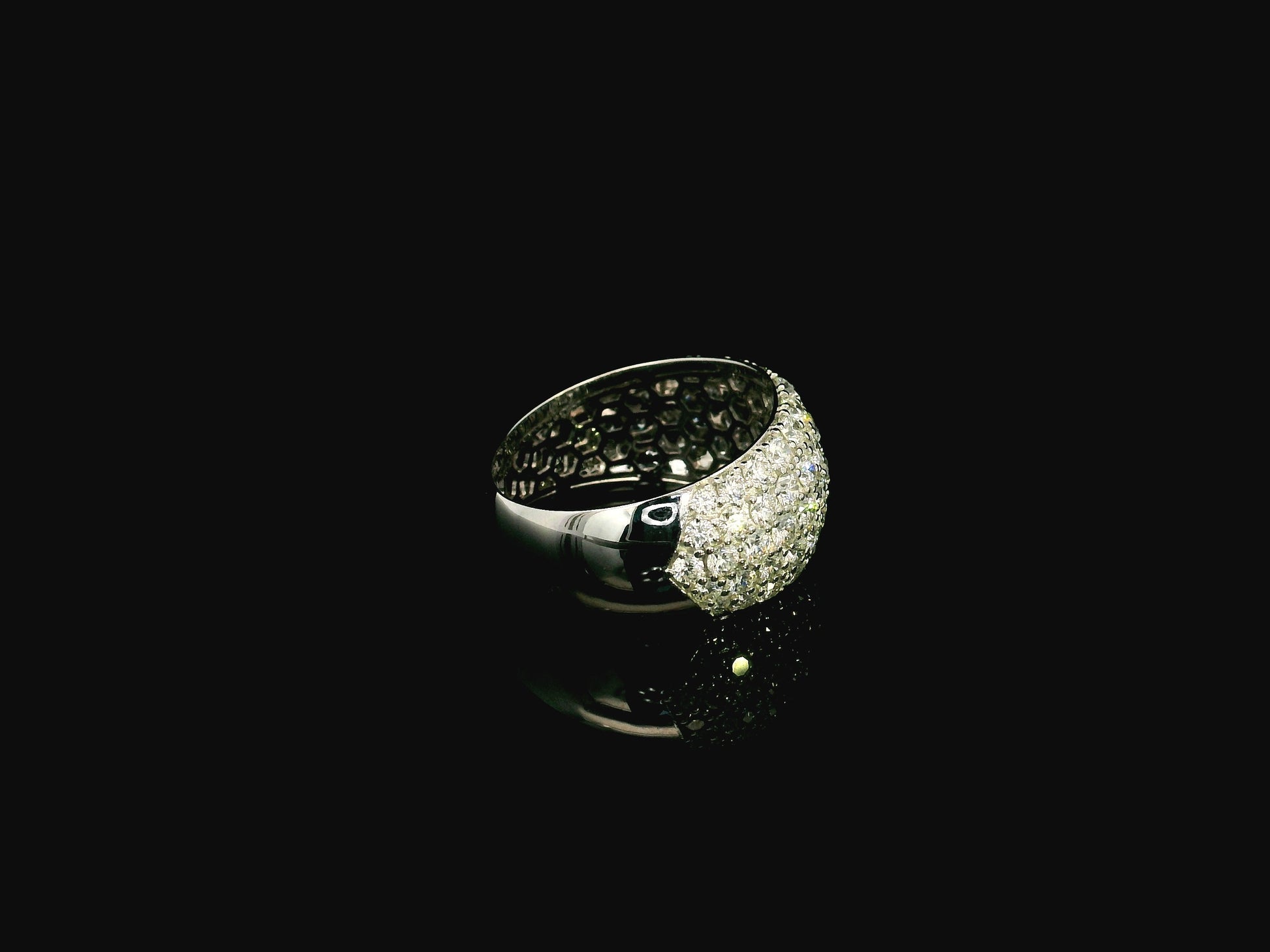 18K white gold wide dome ring featuring 3.21 carats of natural pavé-set diamonds with polished white gold shoulders.