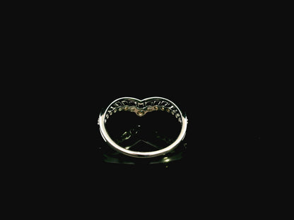 18K white gold graduated chevron diamond ring featuring 0.57 carats of natural diamonds in a V-shaped contour design, perfect as a wedding band, stack ring, or engagement ring enhancer.