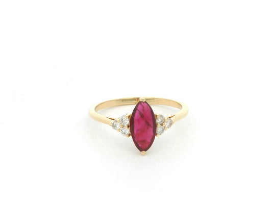 Natural 1.03 carat marquise ruby and diamond ring in solid 18K yellow gold with 0.21 carat natural diamond accents by Emirates Diamonds.