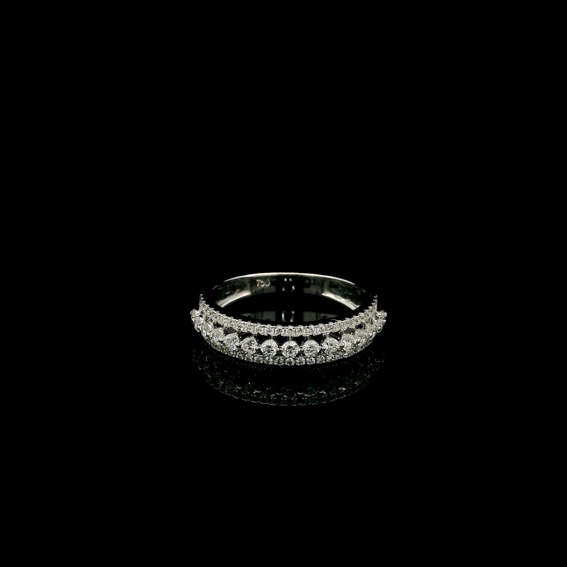 Natural three row diamond wedding band in solid 18K white gold featuring an elevated centre row of round brilliant diamonds with two pavé diamond rows, total diamond weight 0.62 carat.