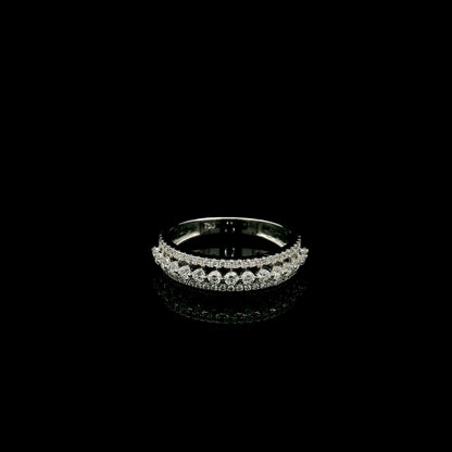 Natural three row diamond wedding band in solid 18K white gold featuring an elevated centre row of round brilliant diamonds with two pavé diamond rows, total diamond weight 0.62 carat.