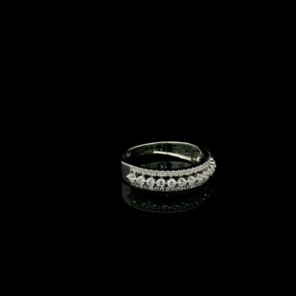 Natural three row diamond wedding band in solid 18K white gold featuring an elevated centre row of round brilliant diamonds with two pavé diamond rows, total diamond weight 0.62 carat.